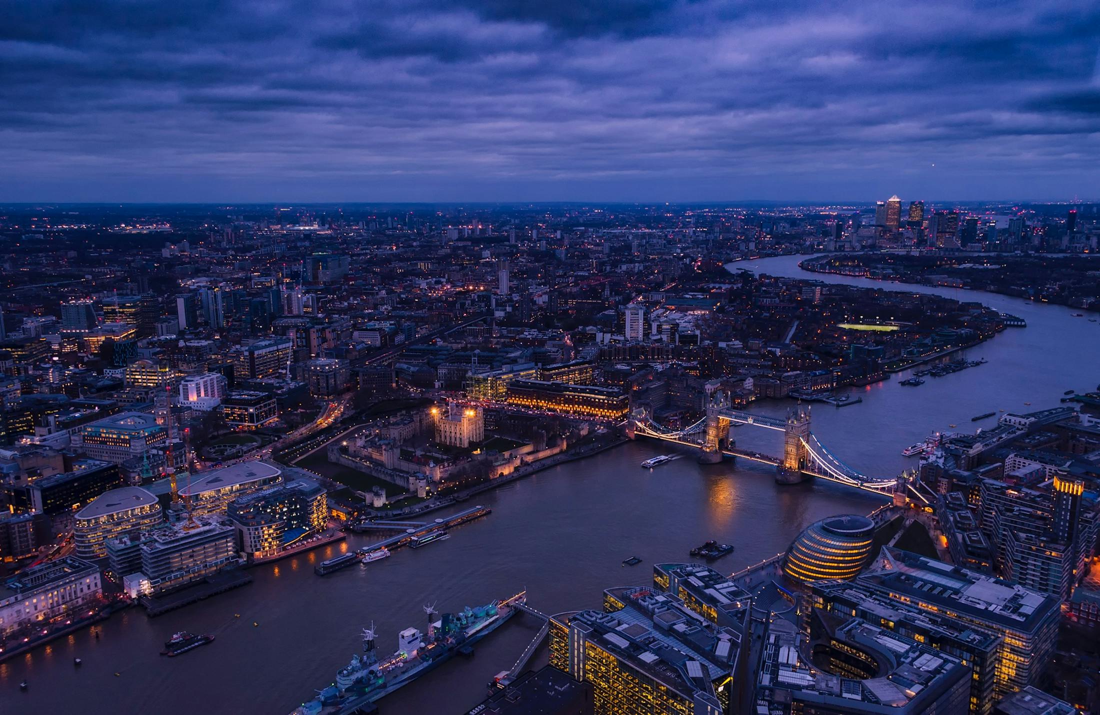 London at dusk with the River Thames and restrained city light.